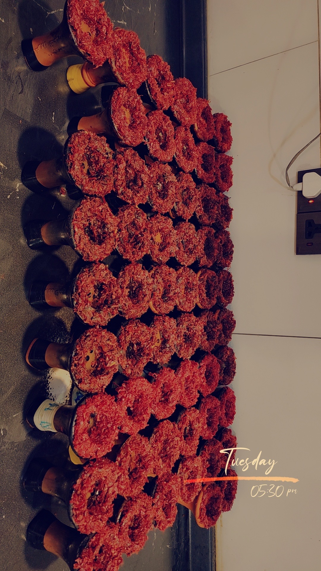 Trays of prepared hookah heads ready to serve